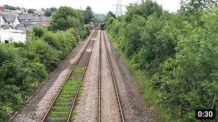 The Flying Scotsman passing through Llanfairpwll Train Station